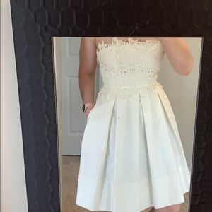 Lace and silk strapless dress with pockets. NWOT